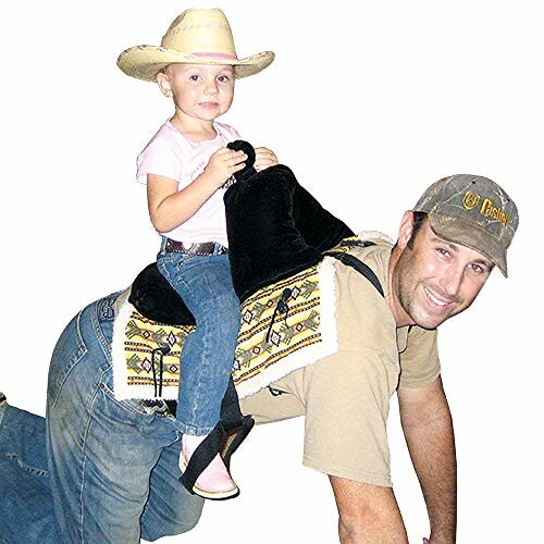 A child in a cowboy hat riding on dad's back with a saddle.