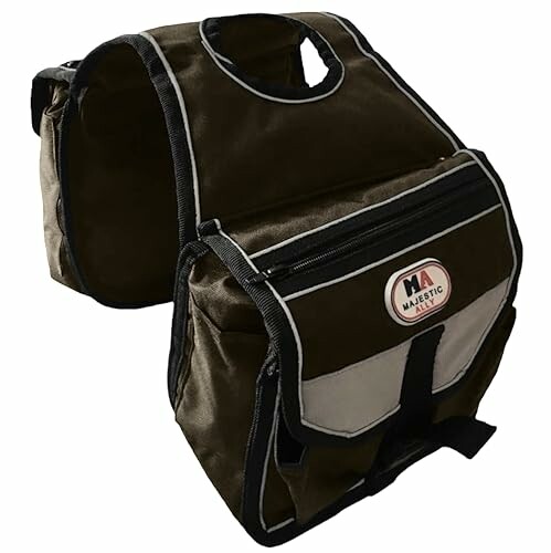 Dog saddlebag with multiple pockets and handle.