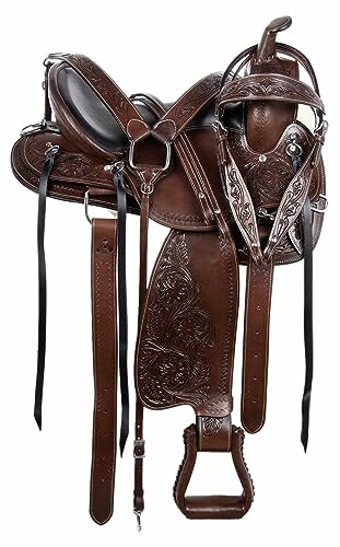 Brown leather Western horse saddle with intricate designs.